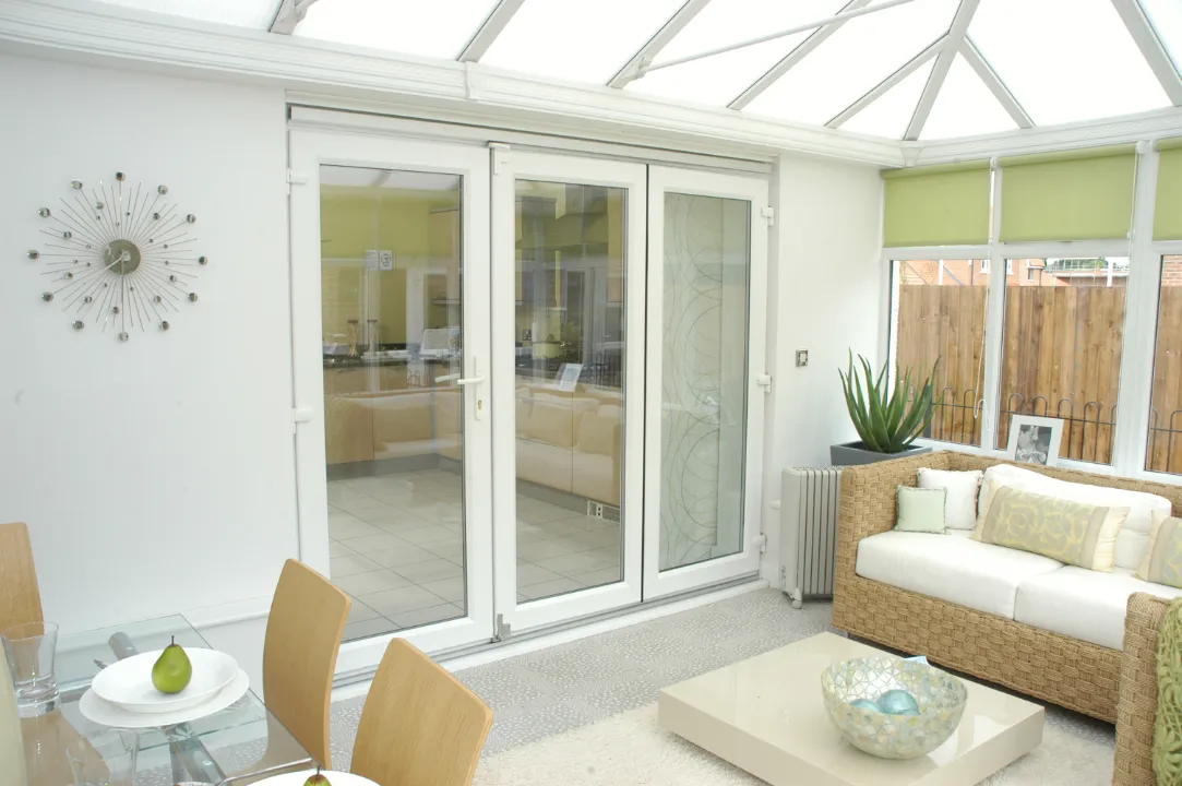 white bifold door installed at hall